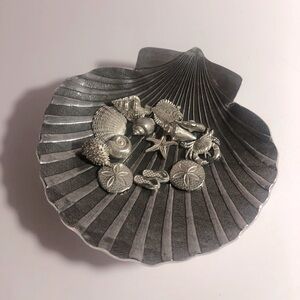 Handcrafted Wendell August aluminum tray with 13 tokens.